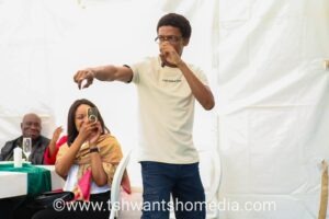 Young man pointing