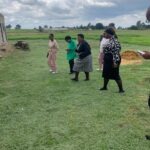 People walking in field